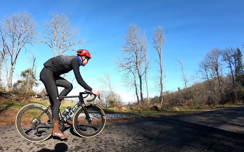 Cyclist on Factor bike, clear blue sky