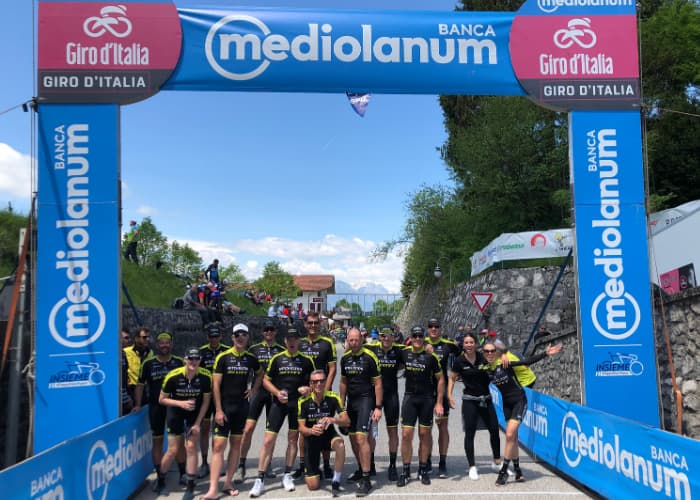 Group photo under Giro d'Italia finish banner