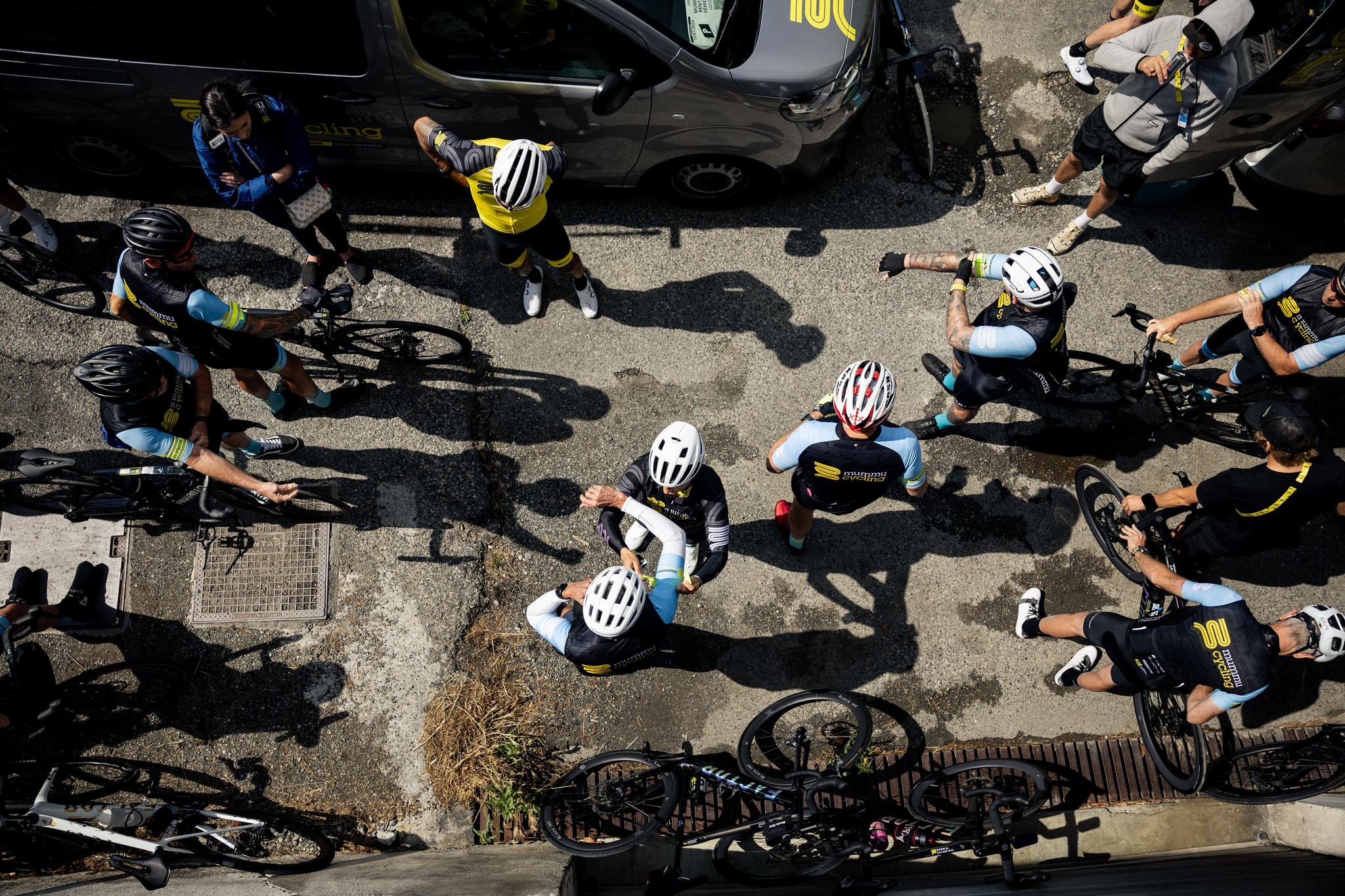 Mummu Cycling guests and staff preparing for a ride, overhead shot.