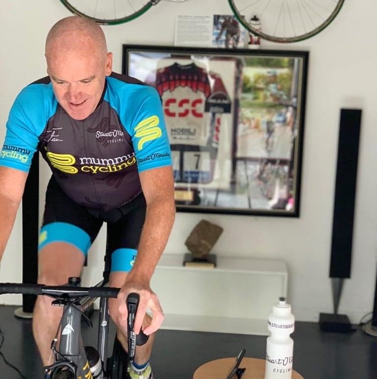 Stuart O'Grady on indoor trainer in Mummu Cycling kit
