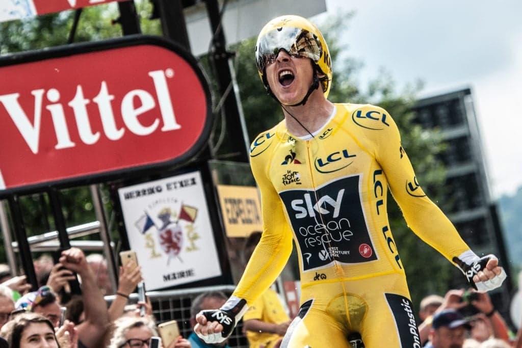 Geraint Thomas celebrates Tour de France victory in yellow jersey