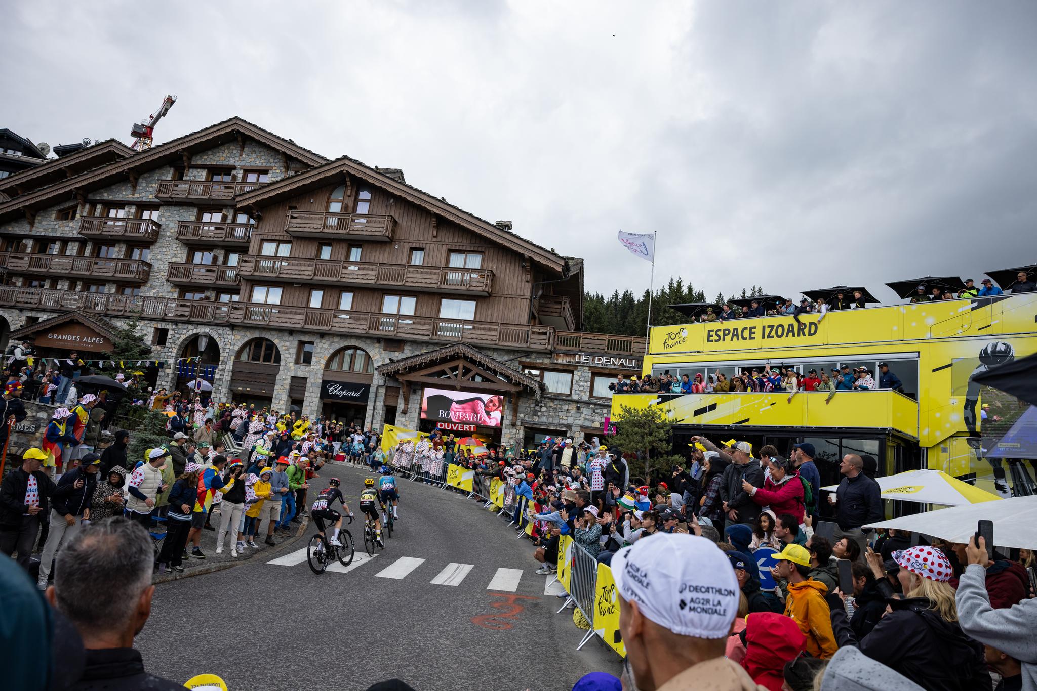 Peloton climbs through packed crowds at Tour de France stage