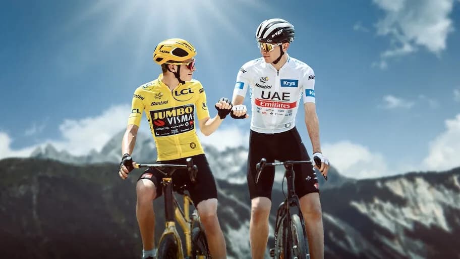 Vingegaard and Pogačar fist bump in Tour de France yellow jersey