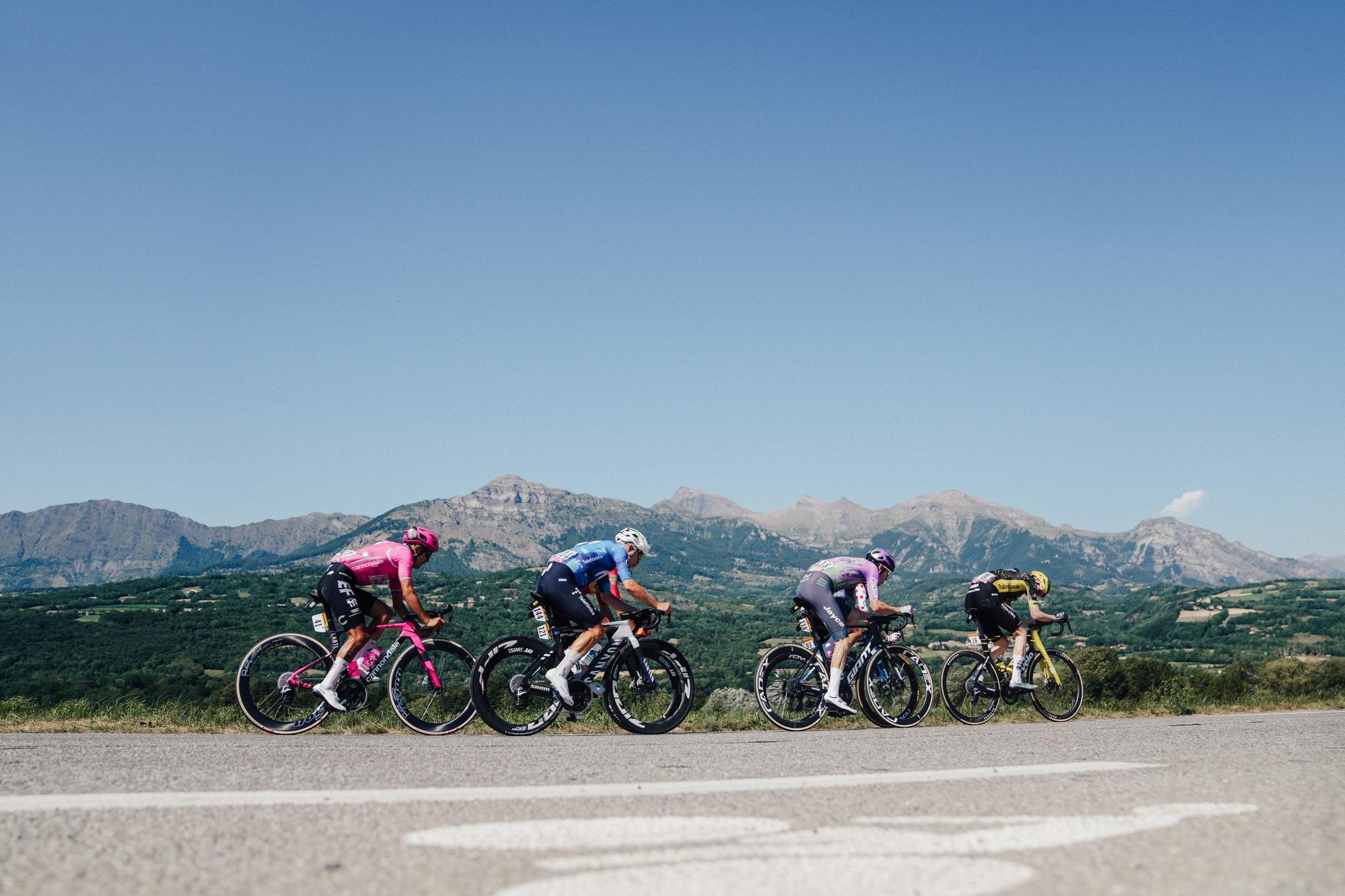 Four rider breakaway against an Alpine skyline, Tour de France 2026 Stage 18