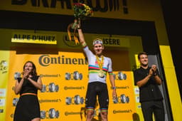 Tadej Pogačar, UCI World Champion, celebrates on the podium at Alpe d'Huez after winning Stage 19 of the Tour de France 2026.